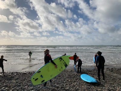 Students surfing in Wales 
